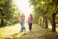 Girls with Apple in the Apple Orchard