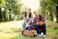 Girls with Apple in the Apple Orchard Royalty Free Stock Photo