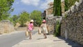 Girls arriving from market in Provence