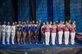 The girls on award ceremony of athletes at Show Olympic champions