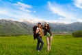 Girls with a backpack in mountains