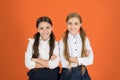 Girls best friends school uniform classmates. Friendly relations at school. Making friends while studying school. School Royalty Free Stock Photo