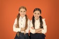 Girls best friends school uniform classmates. Friendly relations at school. Making friends while studying school. School Royalty Free Stock Photo