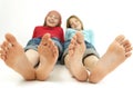 Girls with 'big feet' Royalty Free Stock Photo