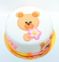 Girls birthday cake with a fondant teddy bear Royalty Free Stock Photo