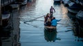 Girls on boat on Venetian canal Royalty Free Stock Photo