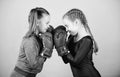 Girls in boxing sport. Boxer children in boxing gloves. Girls cute boxers on blue background. Friendship as battle and