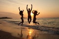 Girls and Boy DANCING IN SUNSET ON SEA Royalty Free Stock Photo