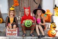 Girls and boy in halloween costumes
