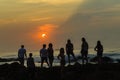 Girls Boys Silhouetted Beach Sunrise Ocean