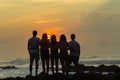 Girls Boys Silhouetted Beach Sunrise Ocean