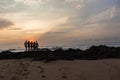 Girls Boys Silhouetted Beach Sunrise Ocean