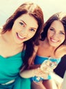 Girls with champagne glasses on boat Royalty Free Stock Photo