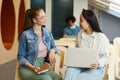 Girls chatting in lecture room Royalty Free Stock Photo