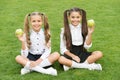 Girls classmates eat healthy school lunch, happy childhood concept