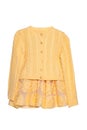 Girls clothes. Festive beautiful yellow little girl sweater or knitted cardigan and a matching yellow summer skirt isolated on a