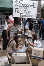 Girls collect boxes of humanitarian aid for the front