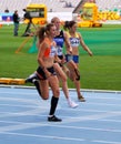 Girls compete in the 200 meters race