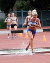 Girls compete in the 3.000 Meter Steeplechase