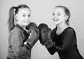 Girls cute boxers on blue background. Friendship as battle and competition. Pass boxing challenge. Test for fortitude