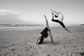 Girls dancing on beach Royalty Free Stock Photo