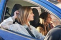 Girls day out. two young women traveling in a car in the city. Royalty Free Stock Photo