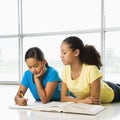 Girls doing schoolwork. Royalty Free Stock Photo