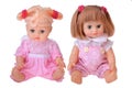 Girls dolls sitting in colorful dress