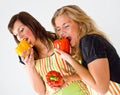 Girls Eating Paprika Royalty Free Stock Photo