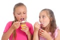 Girls eating yogurt