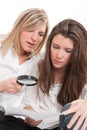 Girls examining document