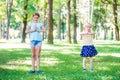 Girls excersise in sunshine park