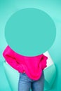 girls without a face in jeans and a pink sweater on a blue background. Mock up for your text or advertisings