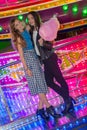 Girls at the fair with candy floss Royalty Free Stock Photo