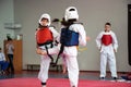 Girls fight in taekwondo