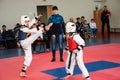 Girls fight in taekwondo