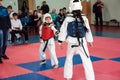 Girls fight in taekwondo