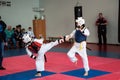 Girls fight in taekwondo