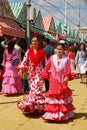 Girls in flamenco dresses at the Seville Fair. Royalty Free Stock Photo