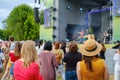 Couple is watching concert at open air music festival