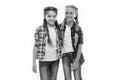 Girls friends wear similar outfits have same hairstyle kanekalon braids white background. Sisters family look outfit Royalty Free Stock Photo