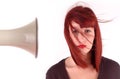 Girls hair blown away by megaphone Royalty Free Stock Photo