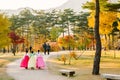 Gyeongbokgung palace, people with Hanbok Korean traditional clothes at autumn in Seoul, Korea Royalty Free Stock Photo