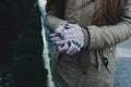 Girls hands in cold winter