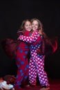 Girls with happy faces hugging tight. Friends having fun Royalty Free Stock Photo