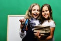 Girls with happy smiling faces and stationery Royalty Free Stock Photo