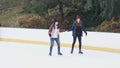 Girls have a lot of fun doing ice skating in New Yorks Central Park