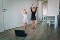 Ballet or gymastics lesson online. Remote learning for kids. Royalty Free Stock Photo