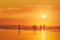 Girls having fun in the beach at sunset Royalty Free Stock Photo