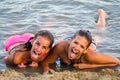 Girls having fun on the beach Royalty Free Stock Photo